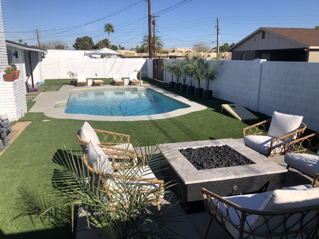 Tempe outdoor living space after renovation and fire pit and artificial turf installation