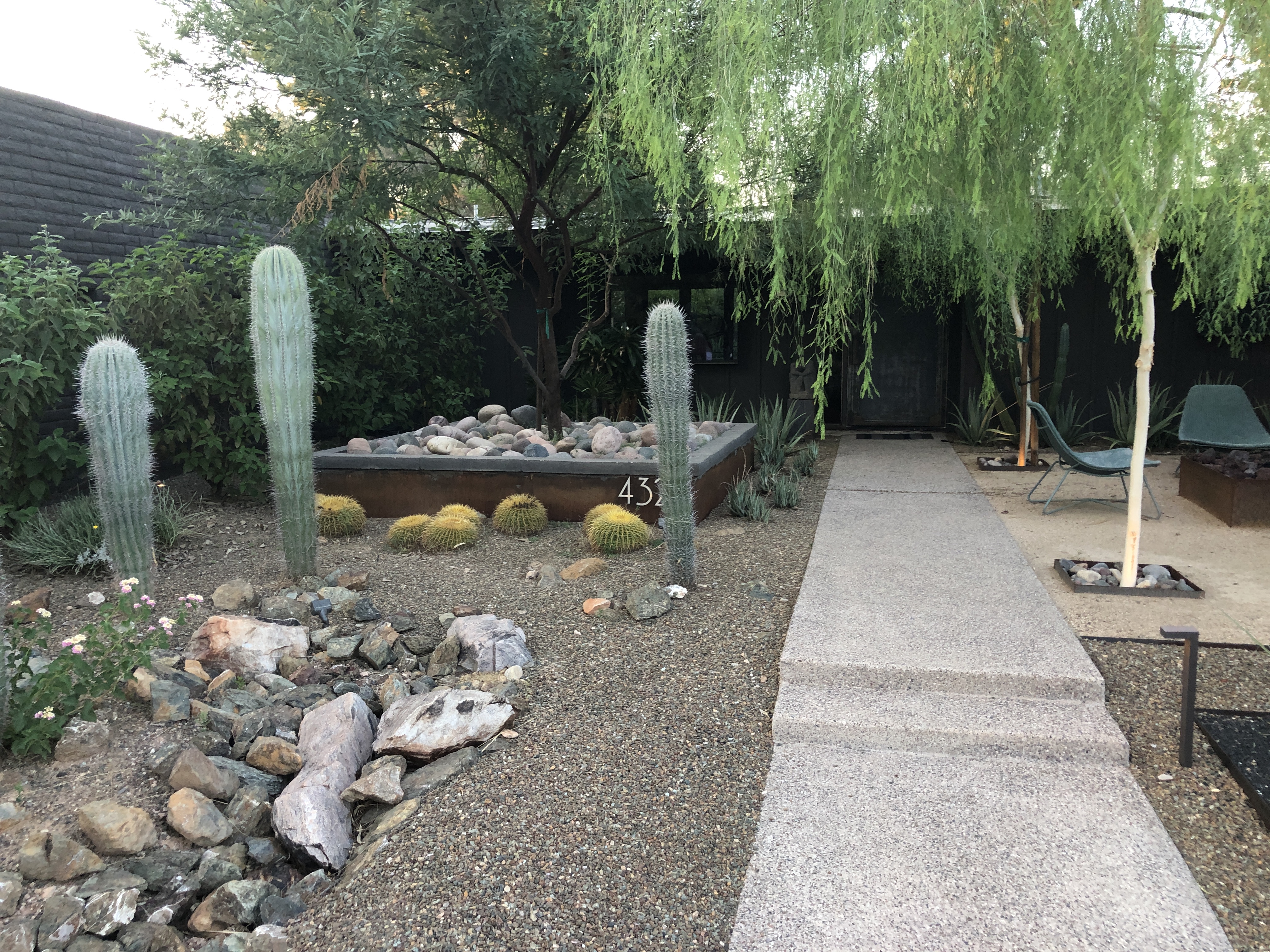 front yard cactus and new landscape gravel installation