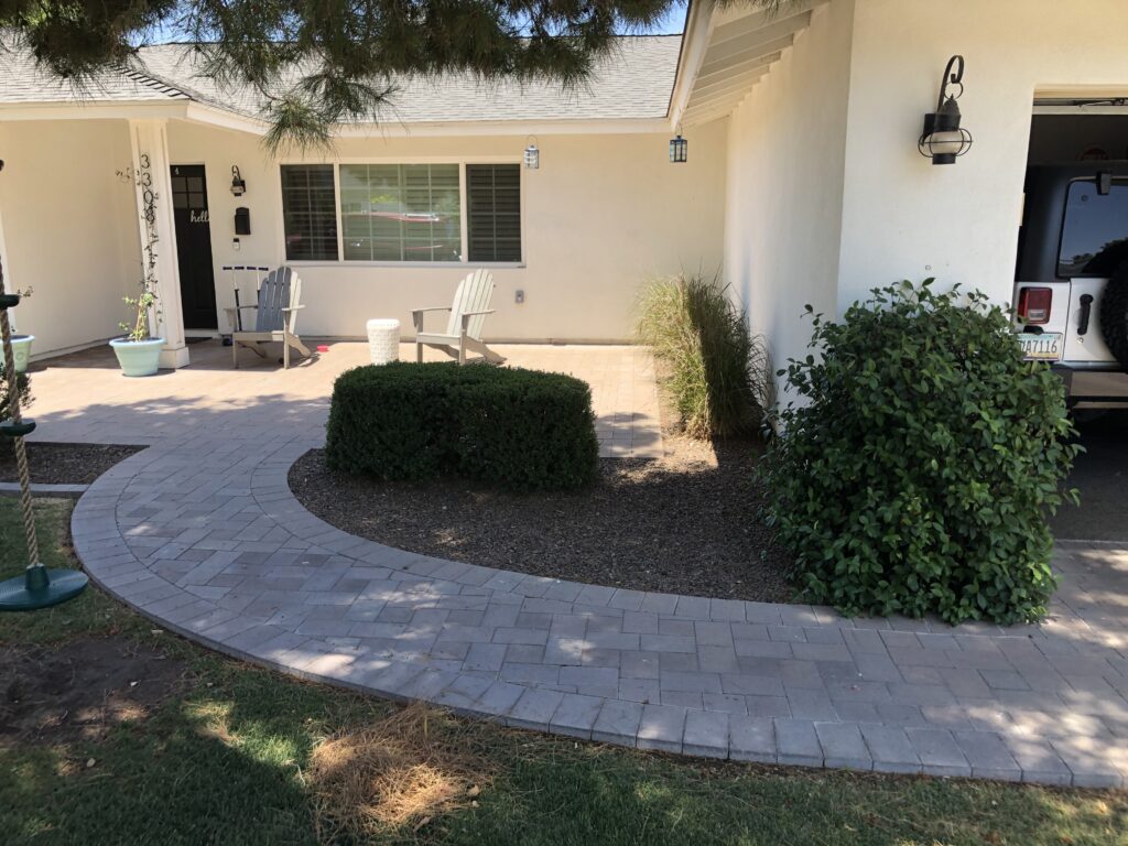 outdoor living space before custom fire place and wall build