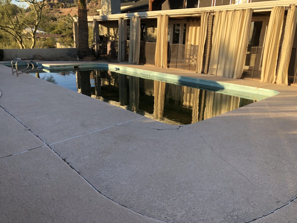 Camelback Mountain pool deck before renovation and limestone installation