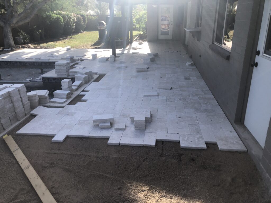 Phoenix back yard during travertine pool deck installation