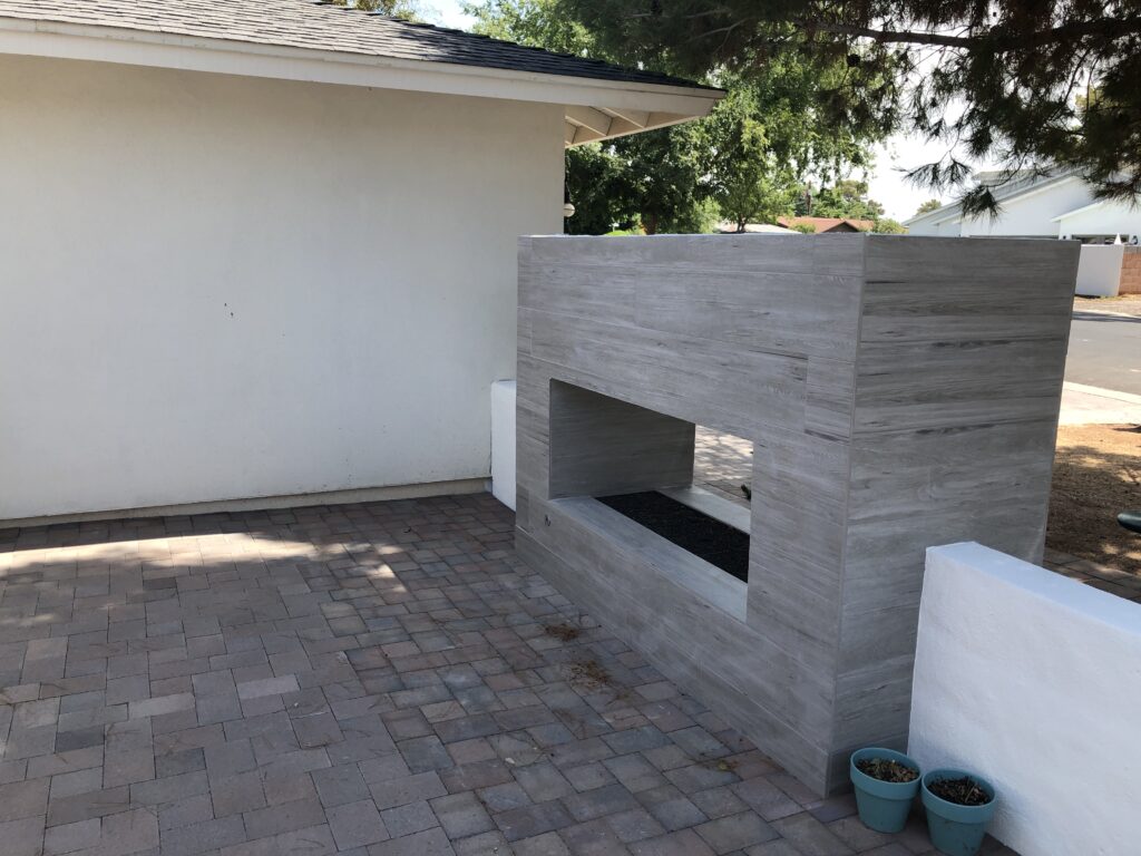 outdoor living space in Arcadia after gas fire place and mason block wall build