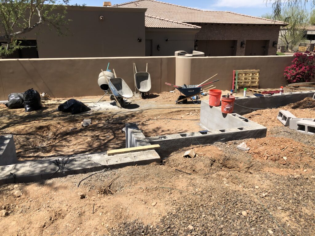 block wall build in North Scottsdale before artificial turf putting green installation installation