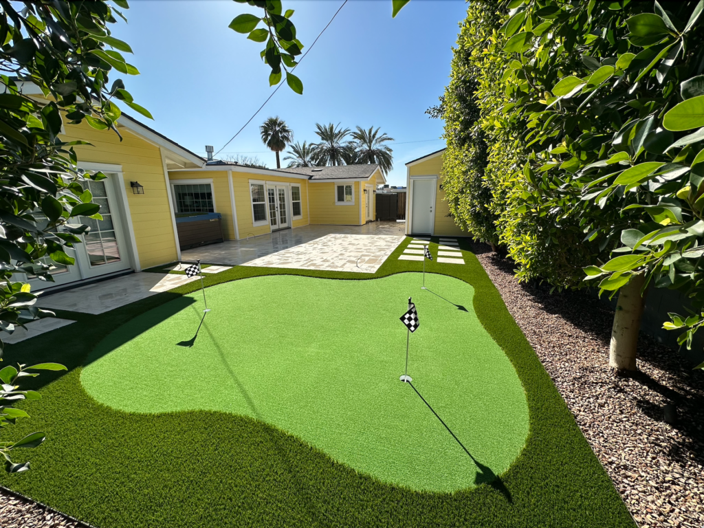 wood deck Arcadia Light after landscaping and synthetic grass putting green installation